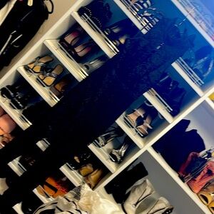 BEBE Exquisite, black and gold jumpsuit with a Pee hole in the front & open back